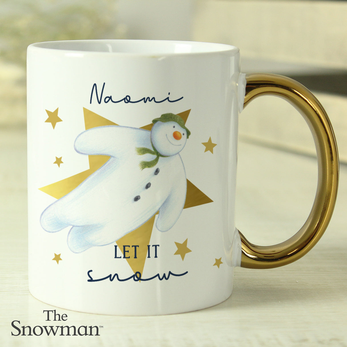 Personalised The Snowman Let it Snow Gold Handed Mug: 3 - Mugs By The Snowman
