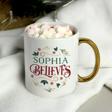 Personalised Believes In Christmas Gold Handled Mug: 2 - Mugs By Gift Moments