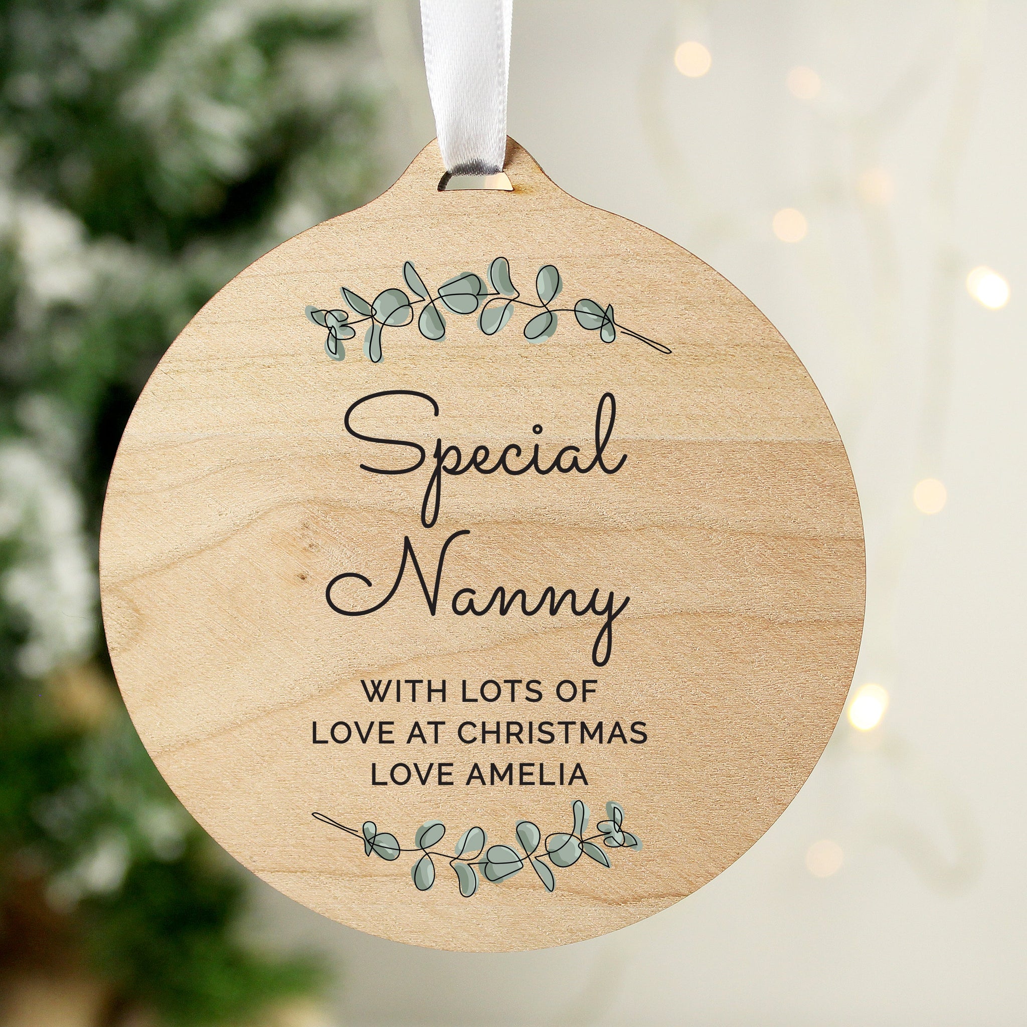 Personalised Botanical Round Wooden Decoration: 4 - Christmas Decorations By Gift Moments