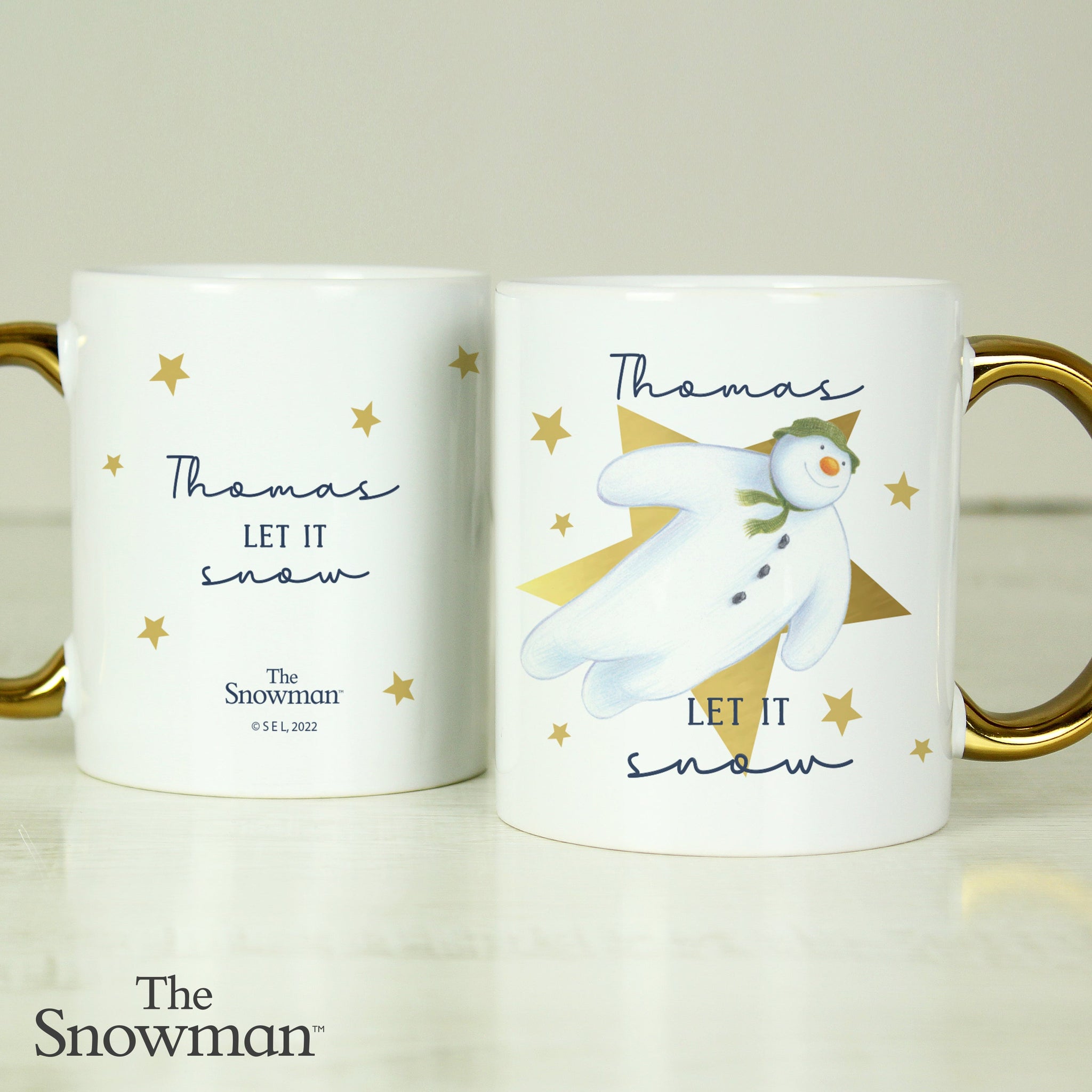 Personalised The Snowman Let it Snow Gold Handed Mug: 2 - Mugs By The Snowman