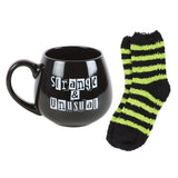 Strange & Unusual Mug and Socks Set: 4 - Mugs By Gift Moments