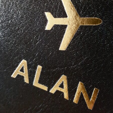 Personalised gold name passport holders set
