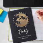 Personalised Moon & Stars Black Hardback Notebook: 1 - Notebooks By Gift Moments