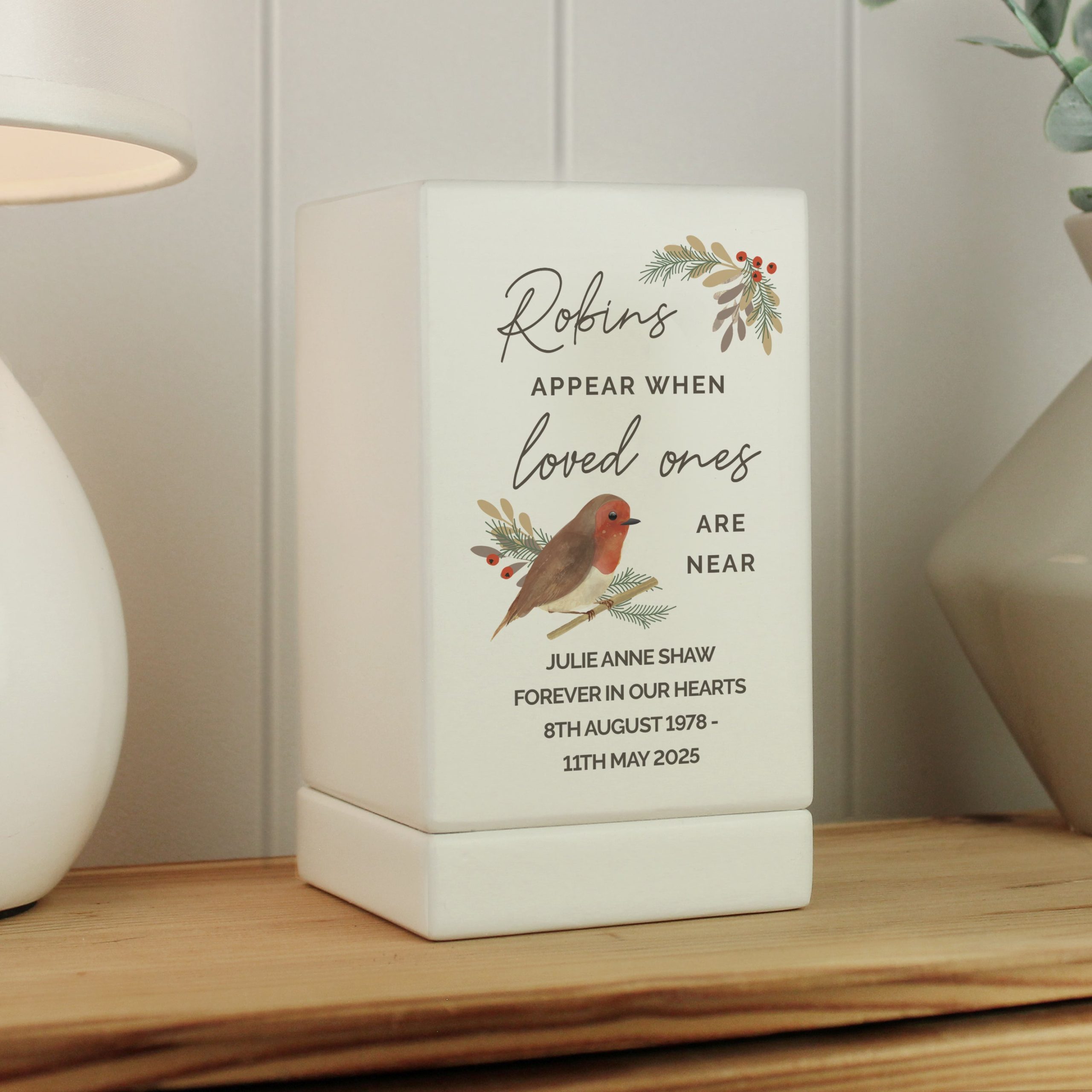Personalised robins appear small wooden urn