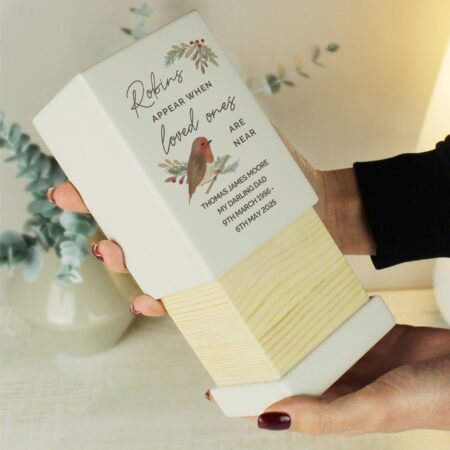 Personalised robins appear small wooden urn