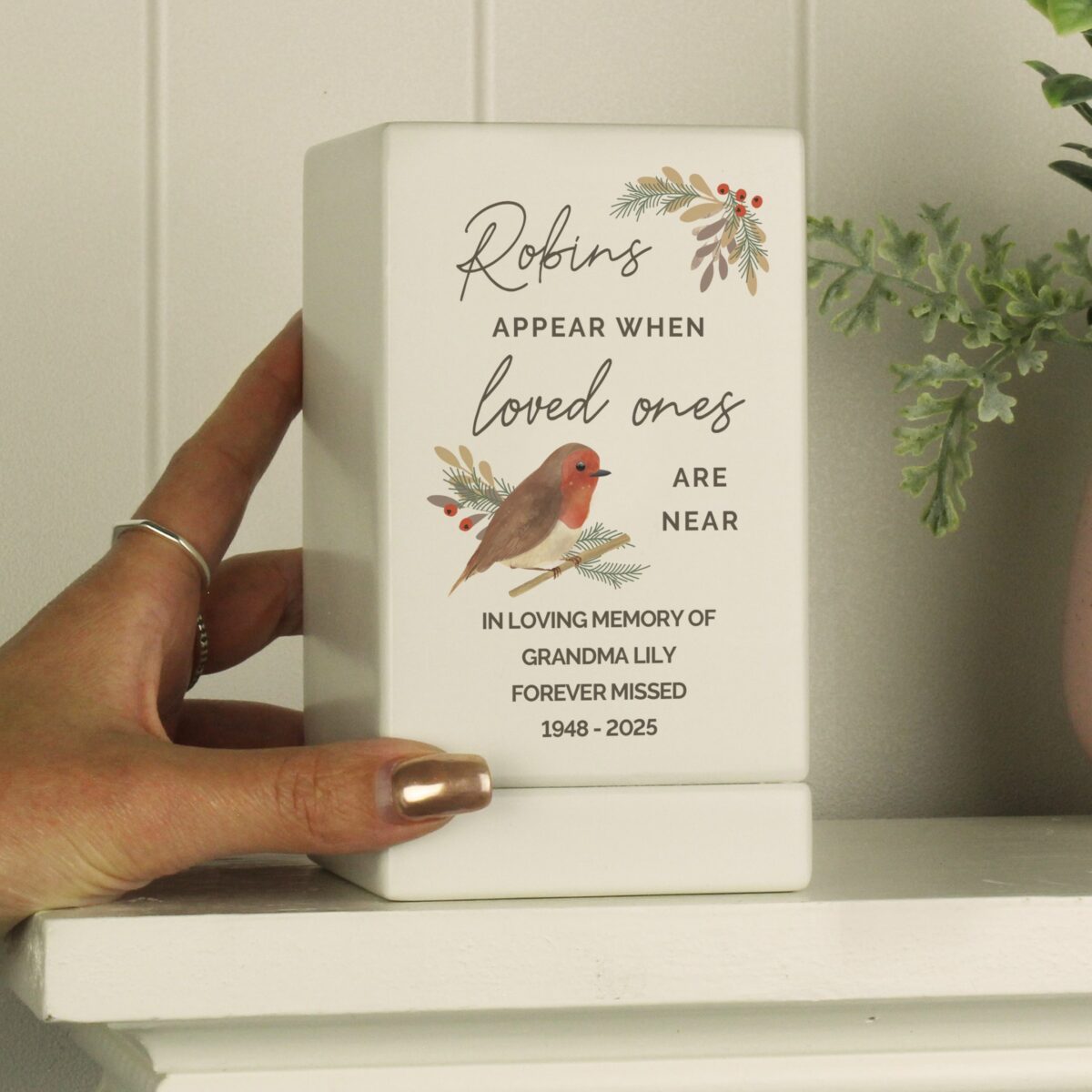 Personalised robins appear small wooden urn