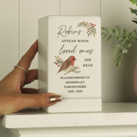 Personalised robins appear small wooden urn