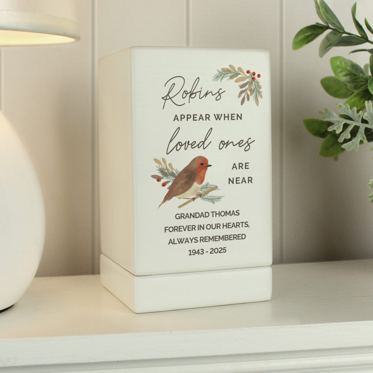 Personalised robins appear small wooden urn