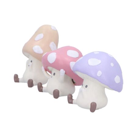 Three wise toadstool figurines see hear speak evil